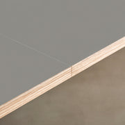 KanademonoのリノリウムAshオーク天板にスクエアのステンレス脚を組み合わせたシンプルモダンな大型テーブル（連結部分）