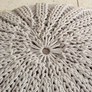 グレーの綿素材をざっくりと編み上げたモロッコインテリア風の円型クッションL（座面）