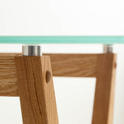 Favricaのガラス天板（幅140cm）とナチュラルカラーのHライン木製脚を組み合わせたテーブル（天板取り付け用部品２）