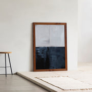 KANADEMONOの白と黒のシンプルなコントラストが独特の世界観をもつシックモダンなアートA1＋ブラウン木製フレーム（エントランス使用例）