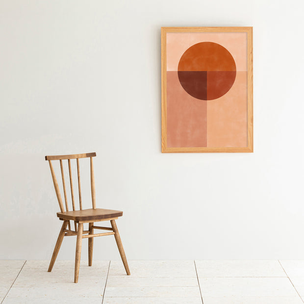 Kanademonoの赤×オレンジの暖色でまとめたモダン抽象画アートA1＋ナチュラルウッドフレーム（チェアとのコーディネート例）