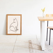 KANADEMONOの猫のおすわりをモチーフにしたモダンなドローイングアートA２＋木製ナチュラルフレーム（ダイニング使用例）